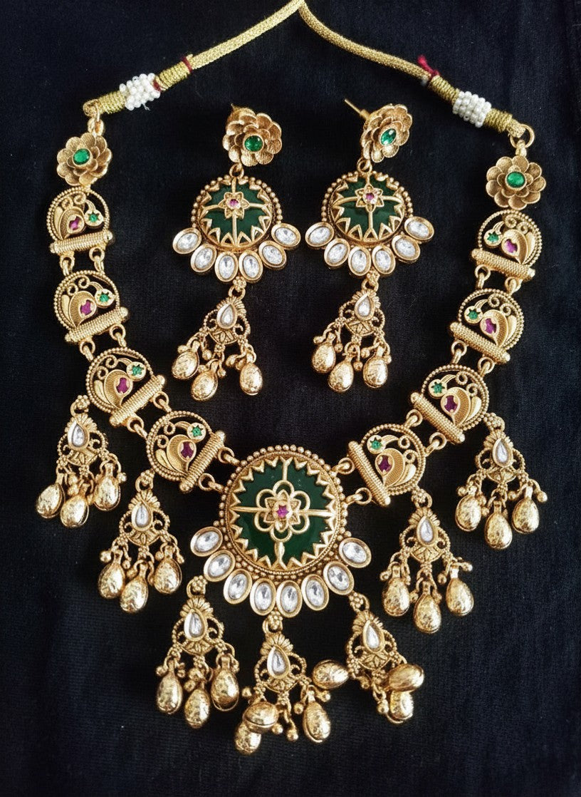 Kundan Meenakari Necklace Set with Emerald Star Disc Pendant, Polki Stones, Gold Ghungroo Drops & Chandbali Earrings for Women